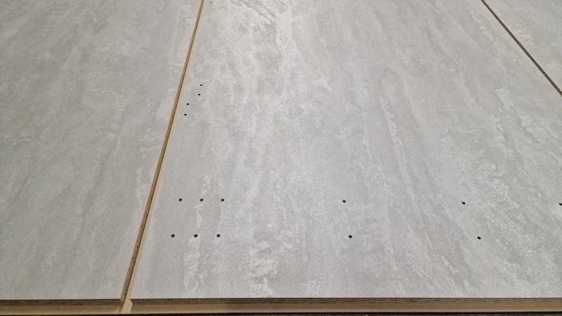 Implantation des perçages dans un panneau de meuble — atelier CNC BK76